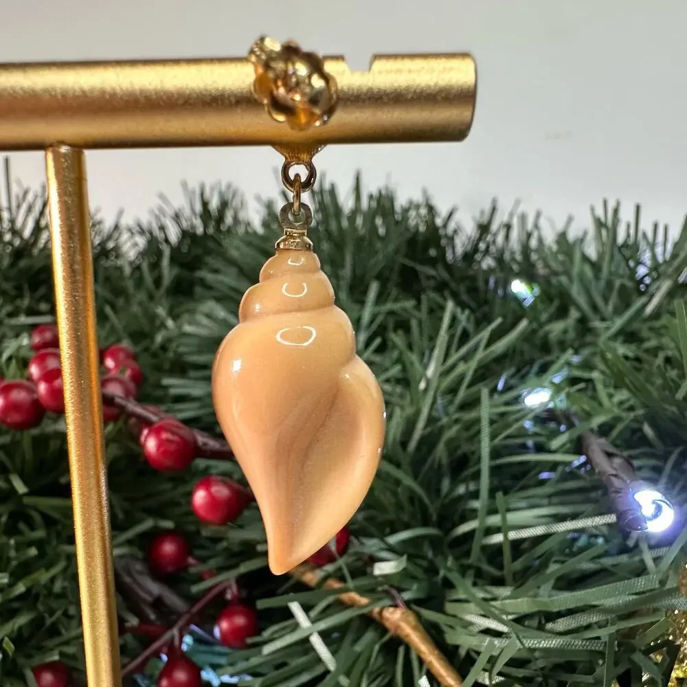 Conch stud earrings
